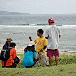 Kuya Nards showing some lime found on the beach